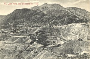 Photo of the Mount Lyell mine. The open cut in the centre of the picture is what is left of the Irob Blow.